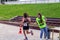 Volunteers help athletes at the triathlon stage by distributing water and energy drinks