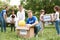 Volunteers and kids with donation boxes