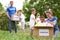 Volunteers and kids with donation boxes