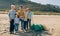 Volunteers posing after cleaning the beach