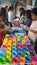 Volunteers prepare food for feeding program in a slum community