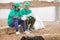 Volunteers resting on shore