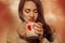 Voluptuous young brunette with hot drink in cup