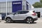 Volvo XC40 Recharge Twin AWD display at a dealership. Volvo offers the XC40 in Core, Plus, and Ultimate models