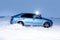 Vorkuta, Komi / Russia - 12 01 2018: Skoda Rapid blue car in winter in snow with headlights on