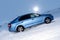 Vorkuta, Komi / Russia - 12 01 2018: Skoda Rapid blue car in winter in snow with headlights on