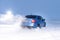 Vorkuta, Komi / Russia - 12 01 2018: Skoda Rapid blue car in winter in snow with headlights on