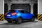 Vorkuta, Komi / Russia - 12 08 2017: Nissan Qashqai Metallic blue crossover car In a closed parking lot on a dark background