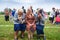 Voroblevychi village, Ukraine - August 13, 2017: Three older women celebrating the Day of the village. Positive emotions: happy,