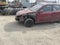 Voronezh, Russia April 2, 2021: Close up of broken car on street. Damaged bumper, bonnet and bodywork of red car after