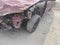 Voronezh, Russia April 2, 2021: Close up of broken car on street. Damaged bumper, bonnet and bodywork of red car after