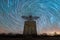 Vortex spiral star trails behind an abandoned radar tower in Camp Hero Montauk New York