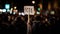 Vote sign held by a black hand, rally night, polling, elections, politics, voting, political, black lives matter, equality