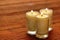 Votive Candle Burning on Bamboo Mat