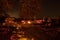 Votive candles lantern burning on the graves in Slovak cemetery at night time. All Saints\' Day. Solemnity of All Saints