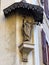 Votive statue in the corner of a building in the historic center of Rome in Italy.