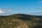 Vozka hill with rock formation from Cervena hora hill in Jeseniky mountains in Czech republic