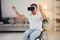 In VR glasses. Disabled man in wheelchair is at home