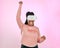 Vr glasses, futuristic software and black woman winner celebration of game win in studio. Pink background, isolated and