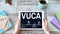 VUCA world concept on screen. Volatility, uncertainty, complexity, ambiguity.