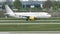 Vueling jet doing taxi in Munich Airport, MUC