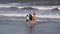 Vung Tau, Vietnam - January 26, 2018: Vietnamese girls take pictures of themselves in the sea.