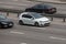 VW Golf white speeding on empty highway