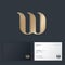 W monogram. Wind symbol. Golden letter W with bended elements.