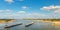 The Waal river near Nijmegen with cargo ships passing by