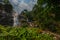 Wachirathan waterfall surrounded by lush tropical forest in Doi Inthanon National Park near Chiang Mai