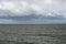 Wadden Sea landscape in the northern Netherlands near Den Oever with windbeaten ocean and an expressive cloudy sky