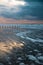 Wadden sea at low tide, North sea beach landscape, coast on Romo island in Denmark at sunset, vacation und lifestyle