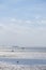 Wadden Sea.Silhouettes of people on the beach.Frisian Islands of Germany. walking on watt dunes.Walks along the sandy