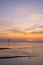 Waddenzee or wadd sea during sunset seen from jetty of ameland ferry