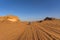 Wadi rum desert Jordan. in a beautiful landscape, bedouin people drive cars most tourists around to show the beauty of the desert,