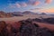 Wadi Rum desert, red sand with stone and rock. Evening pink violet sunset in nature. Travel Jordan, Arabia nature. Jordan mountain