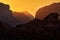 Wadi Rum desert, red send with stone and rock. Evening orange sunset in nature. Travel Jordan, Arabia nature. Sunset in the rock