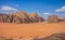 Wadi Rum picturesque desert scenic top view orange sand valley and beautiful huge rock mountain ridge vivid colorful