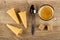 Wafer horns with cream, spoon, sugar, cup with coffee on table. Top view