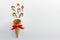 Waffle cone, small candy canes, red star and red satin bow