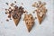 Waffle cones with different sugar on light background