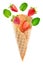 Waffle cones with flying strawberries and mint leaves