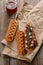 Waffle lollies with jam filling on wooden background