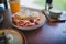 Waffle pancake desert with vanilla ice cream, fresh strawberry and honey syrup