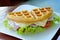 Waffle sandwich with ham and cheese Served