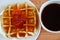 Waffle topping jam and black coffee