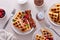 Waffles for breakfast with bacon and berries, breakfast table with variety of food