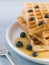 Waffles with Caramel Syrup and Blueberries