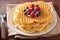 Waffles with creme fraiche and berries for breakfast