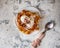 Waffles with ice cream and chocolate chips on a white saucer